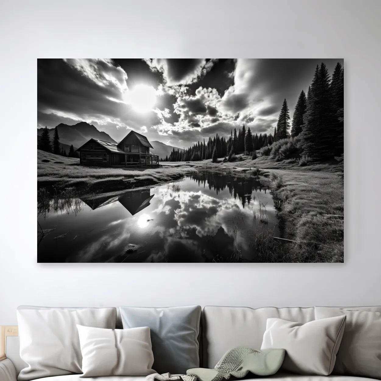Black and white high contrast photograph of a cabin by the lake